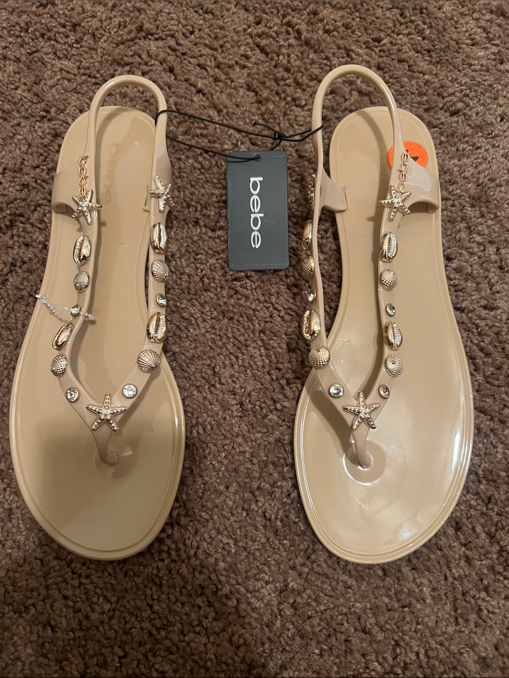 bebe Beige Jelly Slingback Sandals with Gold Shell Charms